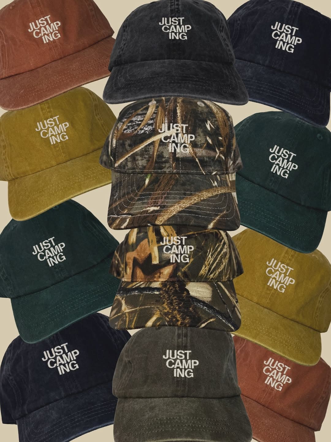 A colorful arrangement of embroidered Just Camping caps